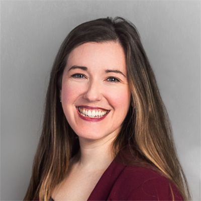 Sarah Connelly smiling in a portrait photo